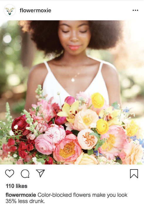Instagram image of a woman holding flowers